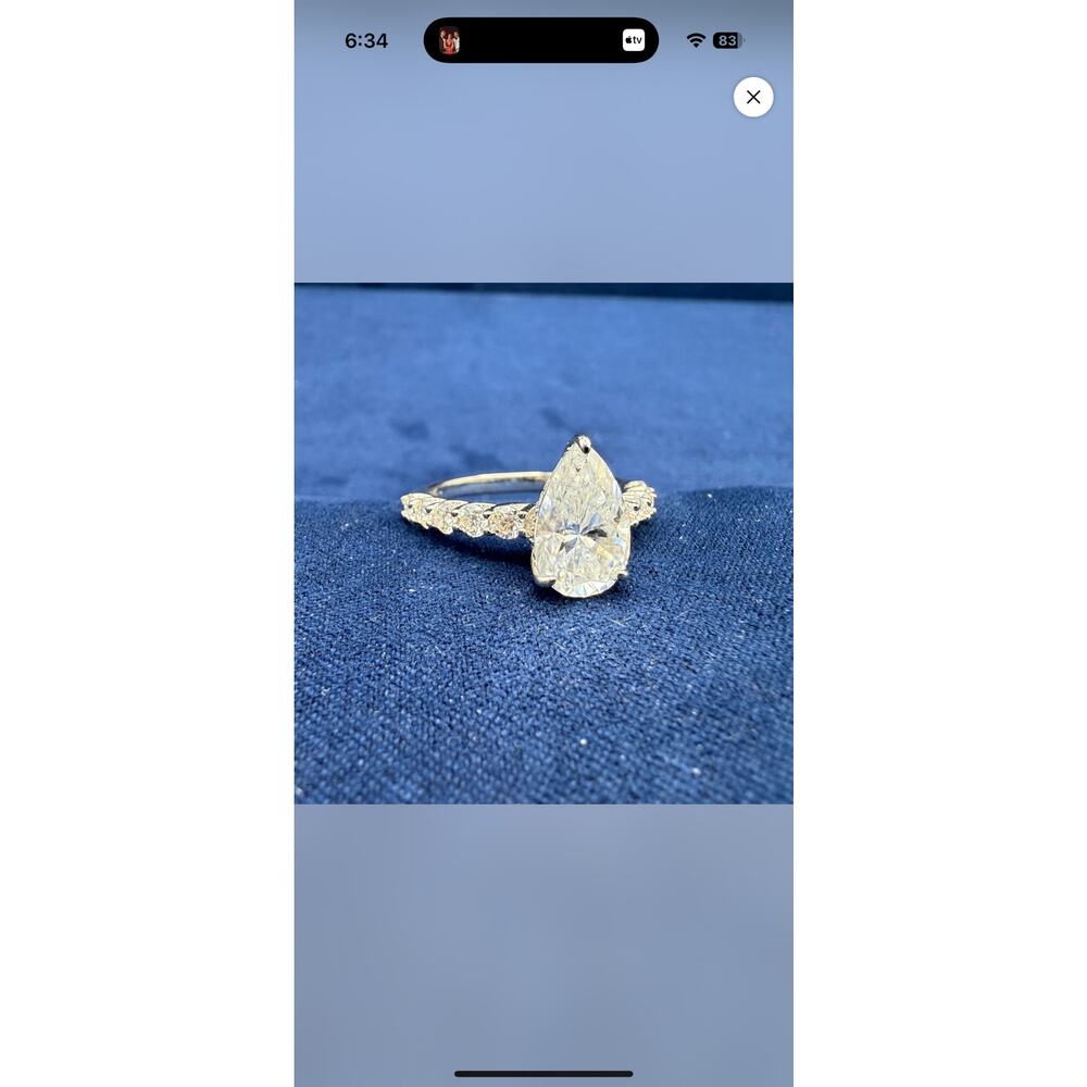 5CTW Pear cut moissanite ring with side stones